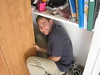 Beth > I recruited Frommer to help me move my closet to the other side of the room.  After we were done, he rested by the corner he had been lifting . . . or was he threatening to pee on my closet?