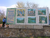Beth > I chose to travel to Zvinagorodka, the small town where Amy and I spent the first night of Pesach, because it was only a 45 minute drive away from Talnoye, the town where my grandfather was born.  This beautiful mural was near the entrance to the town.  The first two lines say "Talne (Talnoye) -  My village!"