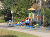 Beth > Walking down my street, we pass by the park - these kids don't waste any time getting to the playground in the morning!