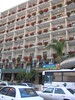 Beth > The Prima Kings Hotel, where Marcia stayed when she visited me.  It's not the newest hotel, but they did just get new pretty flowers!