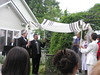 Beth > Amanda's chuppah, with the "interfaith pair" of minister and rabbi standing at the right.