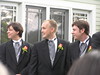 Beth > Brent's groomsmen watch the processional.